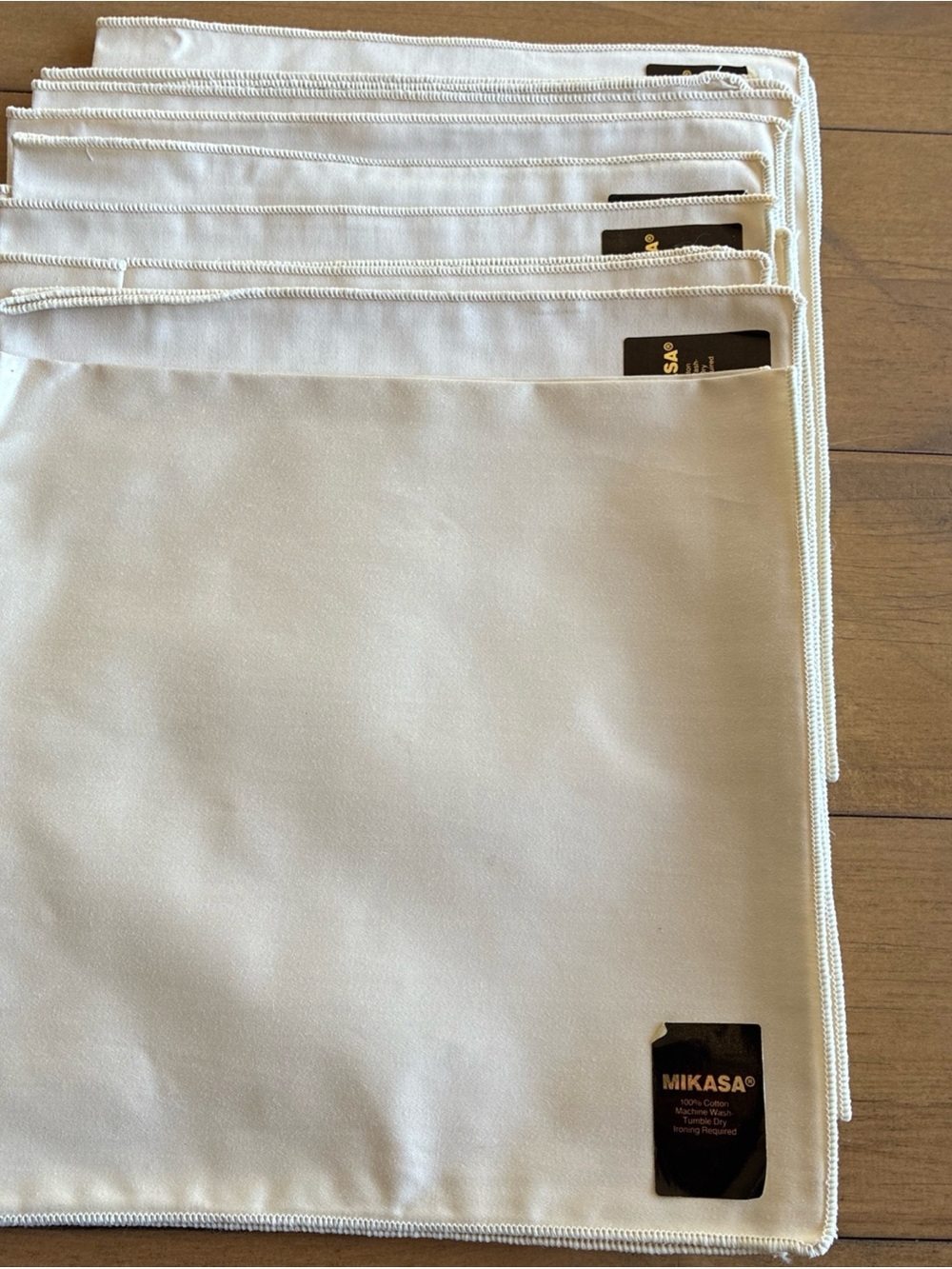 Mikasa Cream Placemats with Branded Black Tag